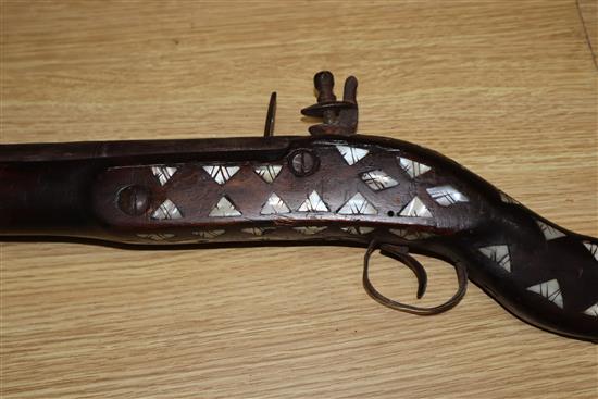 An Indo-Persian mother of pearl inlaid blunderbuss, length 100cm